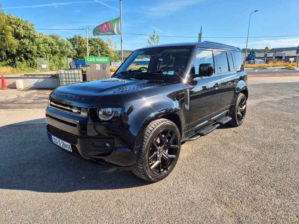 Black Land Rover Defender 110 — gloss-sealed exterior finish after full detail